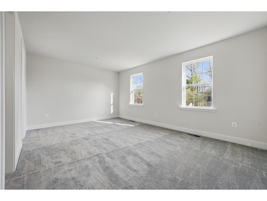 Main Level Bedroom w Bath and Closet next to Family Room